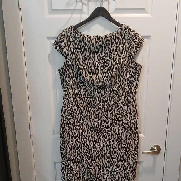 Alyx Dresses & Skirts - Alyx Black and Cream Animal Print Midi Dress